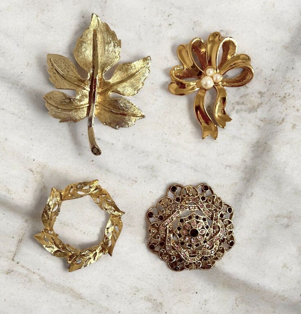 Lot 4 gold tone pins textured, leaves, circle, bow by Avon, filigree vtg